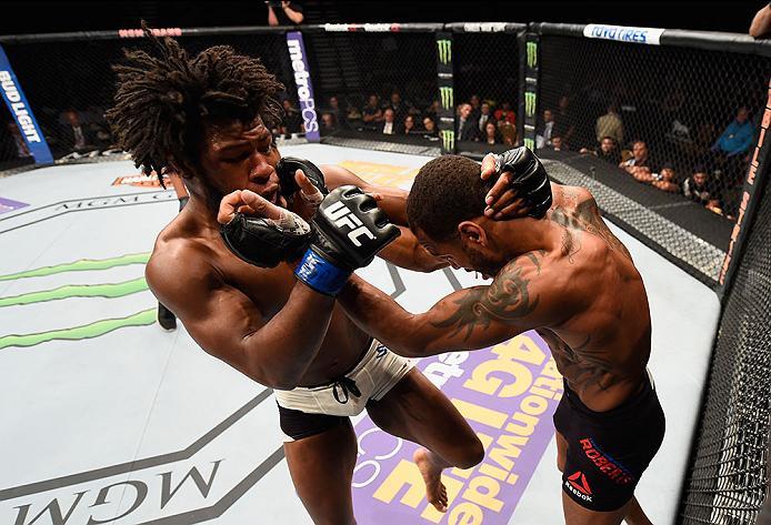 LAS VEGAS, NV - APRIL 23: (L-R) Dominique Steele exchange punches with Danny Roberts of England in their welterweight bout during the UFC 197 event inside MGM Grand Garden Arena on April 23, 2016 in Las Vegas, Nevada. (Photo by Josh Hedges/Zuffa LLC/Zuf