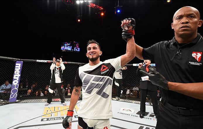 LAS VEGAS, NV - APRIL 23: Sergio Pettis celebrates his victory over Chris Kelades in their flyweight bout during the UFC 197 event inside MGM Grand Garden Arena on April 23, 2016 in Las Vegas, Nevada. (Photo by Josh Hedges/Zuffa LLC/Zuffa LLC via Getty