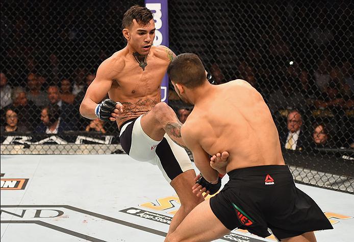 LAS VEGAS, NV - APRIL 23: (L-R) Andre Fili kicks Yair Rodriguez of Mexico in their featherweight bout during the UFC 197 event inside MGM Grand Garden Arena on April 23, 2016 in Las Vegas, Nevada. (Photo by Josh Hedges/Zuffa LLC/Zuffa LLC via Getty Imag