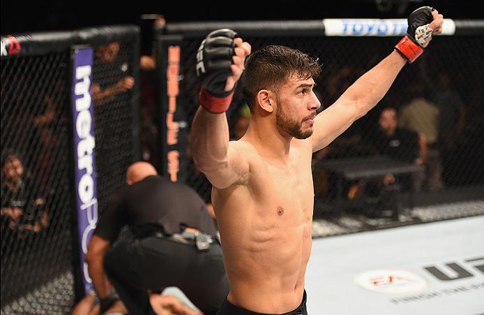 LAS VEGAS, NV - APRIL 23: Yair Rodriguez of Mexico celebrates his knockout victory over Andre Fili in their featherweight bout during the UFC 197 event inside MGM Grand Garden Arena on April 23, 2016 in Las Vegas, Nevada. (Photo by Josh Hedges/Zuffa LLC