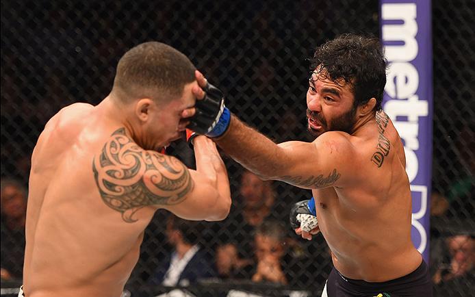 LAS VEGAS, NV - APRIL 23: (R-L) Rafael Natal covers the face of Robert Whittaker of New Zealand in their middleweight bout during the UFC 197 event inside MGM Grand Garden Arena on April 23, 2016 in Las Vegas, Nevada. (Photo by Josh Hedges/Zuffa LLC/Zuf