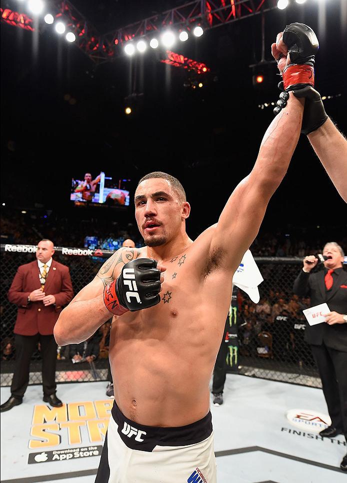LAS VEGAS, NV - APRIL 23: Robert Whittaker of New Zealand celebrates his victory over Rafael Natal after their middleweight bout during the UFC 197 event inside MGM Grand Garden Arena on April 23, 2016 in Las Vegas, Nevada. (Photo by Josh Hedges/Zuffa L