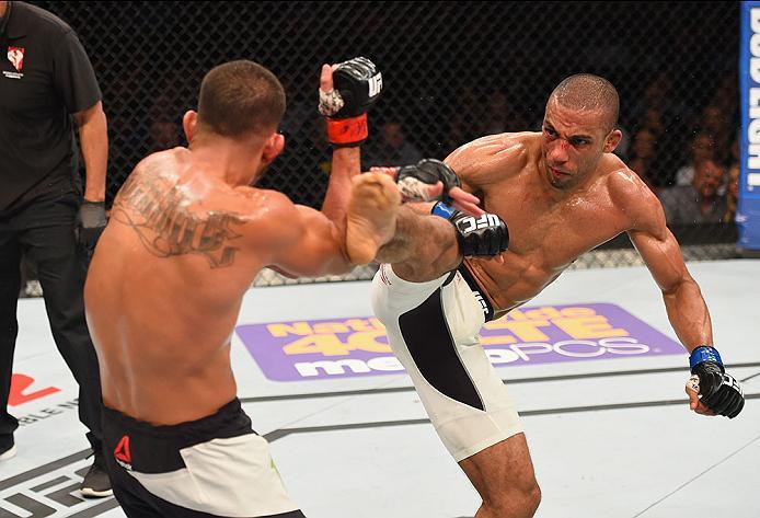LAS VEGAS, NV - APRIL 23: (R-L) Edson Barboza kicks Anthony Pettis in their lightweight bout during the UFC 197 event inside MGM Grand Garden Arena on April 23, 2016 in Las Vegas, Nevada. (Photo by Josh Hedges/Zuffa LLC/Zuffa LLC via Getty Images)