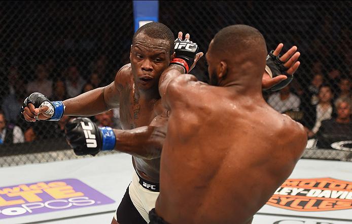 LAS VEGAS, NV - APRIL 23: (L-R) Ovince Saint Preux exchange punches with Jon Jones in their interim UFC light heavyweight championship bout during the UFC 197 event inside MGM Grand Garden Arena on April 23, 2016 in Las Vegas, Nevada. (Photo by Josh Hed