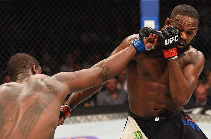 LAS VEGAS, NV - APRIL 23: (L-R) Ovince Saint Preux punches Jon Jones in their interim UFC light heavyweight championship bout during the UFC 197 event inside MGM Grand Garden Arena on April 23, 2016 in Las Vegas, Nevada. (Photo by Josh Hedges/Zuffa LLC/