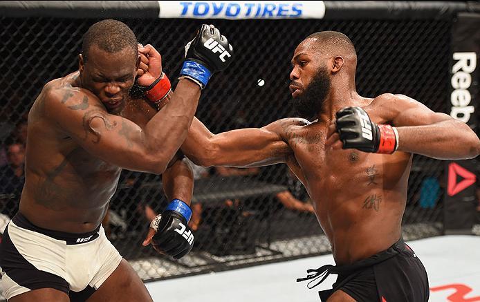 LAS VEGAS, NV - APRIL 23: (R-L) Jon Jones punches Ovince Saint Preux in their interim UFC light heavyweight championship bout during the UFC 197 event inside MGM Grand Garden Arena on April 23, 2016 in Las Vegas, Nevada. (Photo by Josh Hedges/Zuffa LLC/