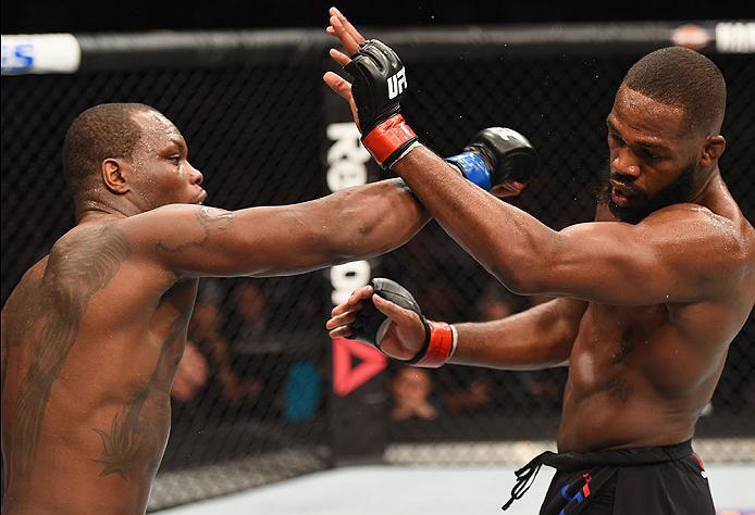 LAS VEGAS, NV - APRIL 23: (L-R) Ovince Saint Preux punches Jon Jones in their interim UFC light heavyweight championship bout during the UFC 197 event inside MGM Grand Garden Arena on April 23, 2016 in Las Vegas, Nevada. (Photo by Josh Hedges/Zuffa LLC/