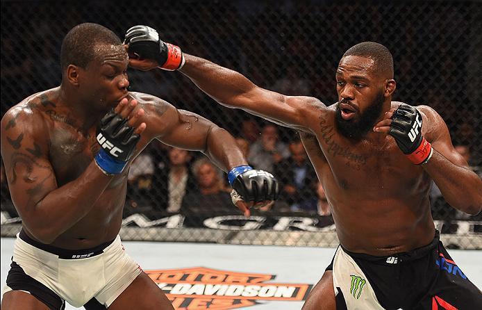 LAS VEGAS, NV - APRIL 23: (R-L) Jon Jones punches Ovince Saint Preux in their interim UFC light heavyweight championship bout during the UFC 197 event inside MGM Grand Garden Arena on April 23, 2016 in Las Vegas, Nevada. (Photo by Josh Hedges/Zuffa LLC/