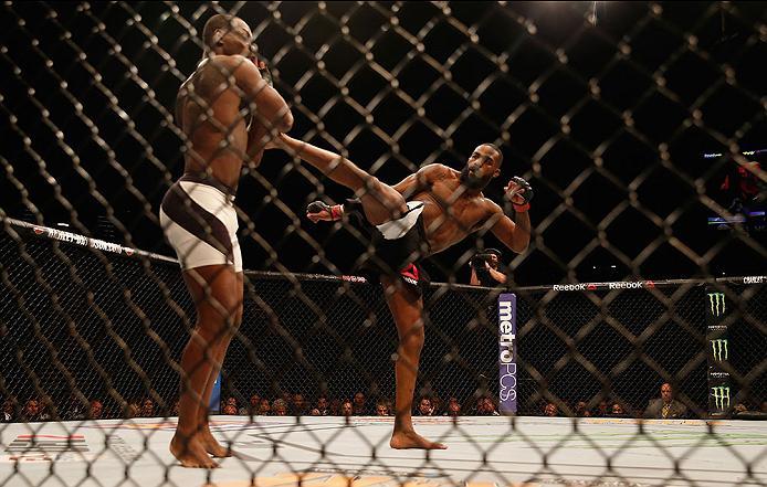 LAS VEGAS, NV - APRIL 23: (R-L) Jon Jones kicks Ovince Saint Preux in their interim UFC light heavyweight championship bout during the UFC 197 event inside MGM Grand Garden Arena on April 23, 2016 in Las Vegas, Nevada. (Photo by Christian Petersen/Zuffa