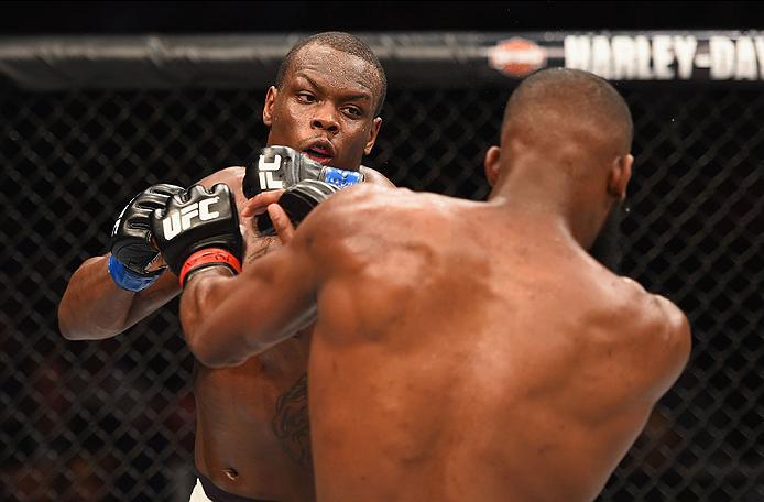 LAS VEGAS, NV - APRIL 23: (L-R) Ovince Saint Preux exchange punches with Jon Jones in their interim UFC light heavyweight championship bout during the UFC 197 event inside MGM Grand Garden Arena on April 23, 2016 in Las Vegas, Nevada. (Photo by Josh Hed