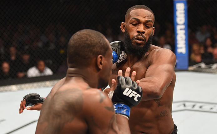 LAS VEGAS, NV - APRIL 23: (L-R) Ovince Saint Preux punches Jon Jones in their interim UFC light heavyweight championship bout during the UFC 197 event inside MGM Grand Garden Arena on April 23, 2016 in Las Vegas, Nevada. (Photo by Josh Hedges/Zuffa LLC/