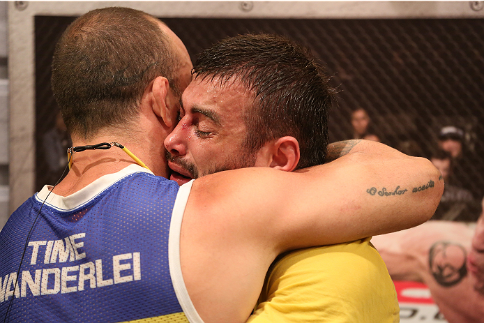 SAO PAULO, BRAZIL - JANUARY 24: (R-L) Team Wanderlei fighter Ricardo Abreu is embraced by coach Wanderlei Silva after defeating Team Sonnen fighter Guilherme de Vasconcelos in their middleweight fight during season three of The Ultimate Fighter Brazil on