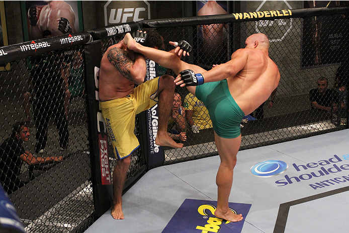 SAO PAULO, BRAZIL - FEBRUARY 4: (R-L) Team Sonnen fighter Vitor Mirande kicks Team Wanderlei fighter Antonio Branjao in their heavyweight fight during season three of The Ultimate Fighter Brazil on February 4, 2014 in Sao Paulo, Brazil. (Photo by Luiz Pi
