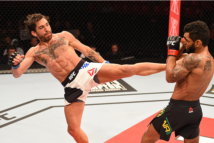 RIO DE JANEIRO, BRAZIL - AUGUST 01: (L-R) Guido Cannetti of Argentina kicks Hugo Viana of Brazil in their bantamweight bout during the UFC 190 event inside HSBC Arena on August 1, 2015 in Rio de Janeiro, Brazil. (Photo by Josh Hedges/Zuffa LLC/Zuffa LL