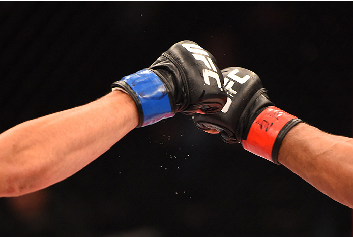 RIO DE JANEIRO, BRAZIL - AUGUST 01: (L-R) Guido Cannetti of Argentina touches gloves with Hugo Viana of Brazil in their bantamweight bout during the UFC 190 event inside HSBC Arena on August 1, 2015 in Rio de Janeiro, Brazil. (Photo by Josh Hedges/Zuff