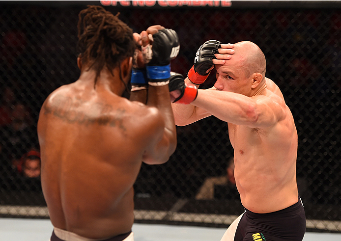 RIO DE JANEIRO, BRAZIL - AUGUST 01: (R-L) Vitor Miranda of Brazil punches Clint Hester of the United States in their middleweight bout during the UFC 190 event inside HSBC Arena on August 1, 2015 in Rio de Janeiro, Brazil. (Photo by Josh Hedges/Zuffa LL