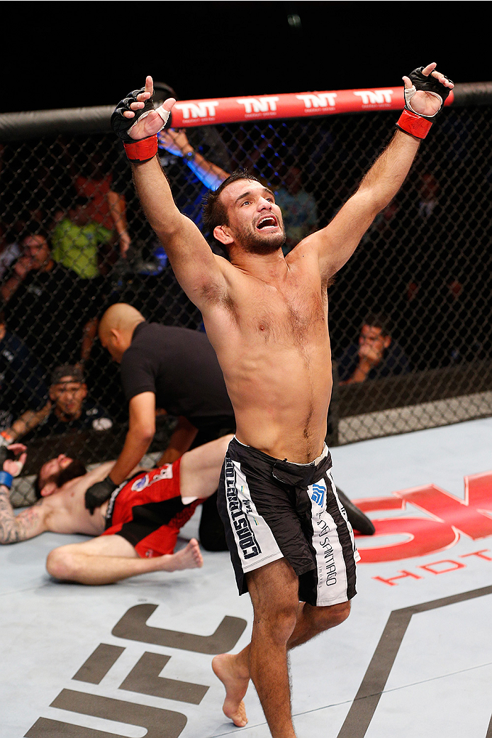 BRASILIA, BRAZIL - SEPTEMBER 13: Rani Yahya of Brazil celebrates after his submission victory over Johnny Bedford in their bantamweight bout during the UFC Fight Night event inside Nilson Nelson Gymnasium on September 13, 2014 in Brasilia, Brazil. (Photo