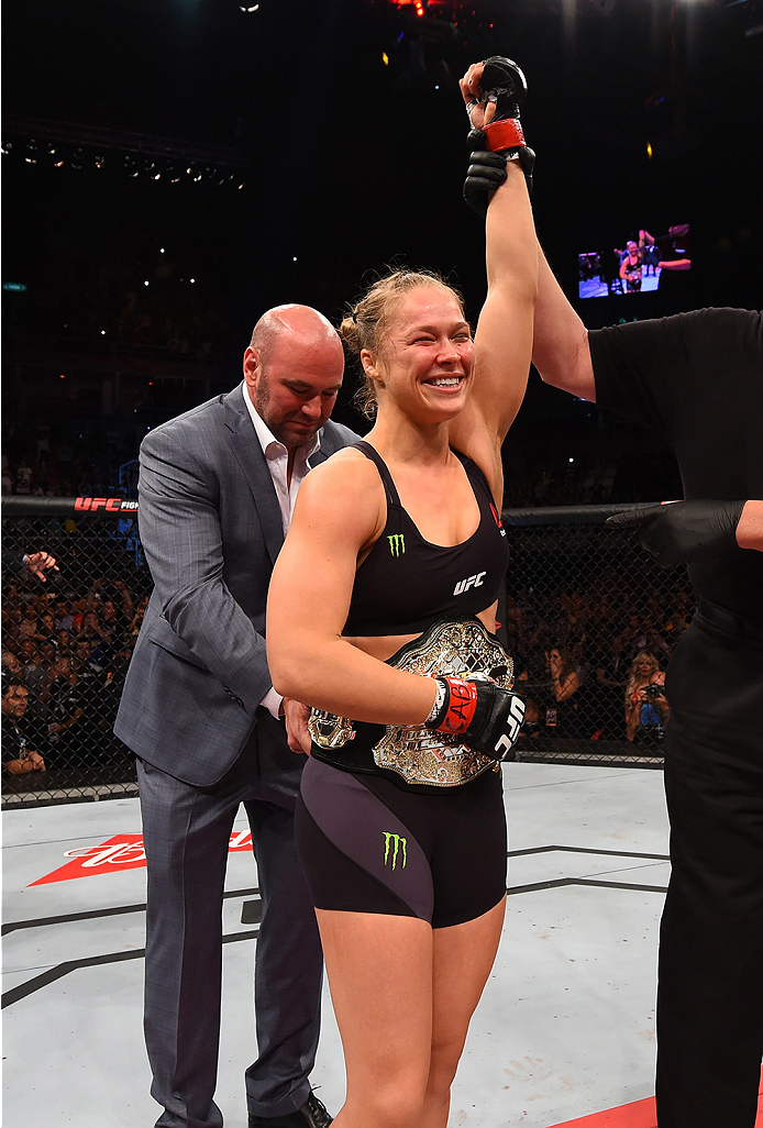 RIO DE JANEIRO, BRAZIL - AUGUST 01: Ronda Rousey of the United States celebrates her knock out victory over Bethe Correia of Brazil in the first round in their UFC women's bantamweight championship bout during the UFC 190 event inside HSBC Arena on Augus