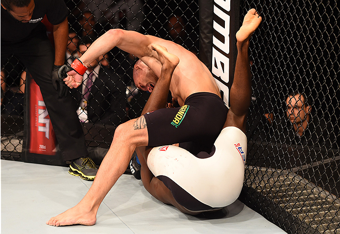 RIO DE JANEIRO, BRAZIL - AUGUST 01: Vitor Miranda of Brazil (top) punches Clint Hester of the United States in their middleweight bout during the UFC 190 event inside HSBC Arena on August 1, 2015 in Rio de Janeiro, Brazil. (Photo by Josh Hedges/Zuffa LL
