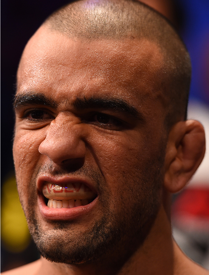 RIO DE JANEIRO, BRAZIL - AUGUST 01: Leandro Issa of Brazil prepares to enter the Octagon before facing Iuri Alcantara of Brazil in their bantamweight bout during the UFC 190 event inside HSBC Arena on August 1, 2015 in Rio de Janeiro, Brazil. (Photo by