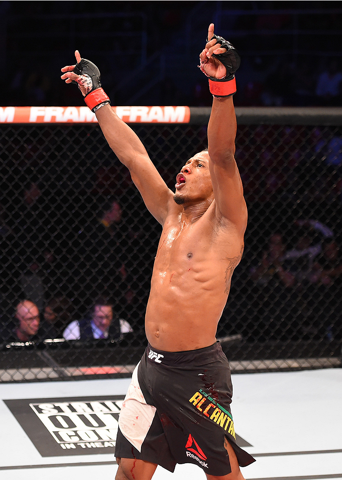 RIO DE JANEIRO, BRAZIL - AUGUST 01: Iuri Alcantara of Brazil celebrates his victory over Leandro Issa of Brazil in their bantamweight bout during the UFC 190 event inside HSBC Arena on August 1, 2015 in Rio de Janeiro, Brazil. (Photo by Josh Hedges/Zuff