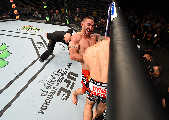 NEW ORLEANS, LA - JUNE 06: (L-R) Joe Proctor attempts to submit Justin Edwards in their lightweight bout during the UFC event at the Smoothie King Center on June 6, 2015 in New Orleans, Louisiana. (Photo by Josh Hedges/Zuffa LLC/Zuffa LLC via Getty Imag