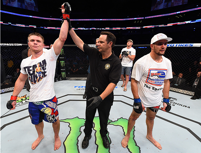 NEW ORLEANS, LA - JUNE 06: (L-R) Chris Wade celebrates his victory over Christos Giagos in their lightweight bout during the UFC event at the Smoothie King Center on June 6, 2015 in New Orleans, Louisiana. (Photo by Josh Hedges/Zuffa LLC/Zuffa LLC via G