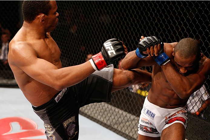 BRASILIA, BRAZIL - SEPTEMBER 13: (L-R) Francisco Trinaldo of Brazil kicks Leandro Silva of Brazil in their lightweight bout during the UFC Fight Night event inside Nilson Nelson Gymnasium on September 13, 2014 in Brasilia, Brazil. (Photo by Josh Hedges/