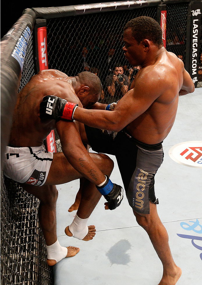 BRASILIA, BRAZIL - SEPTEMBER 13: (R-L) Francisco Trinaldo of Brazil knees Leandro Silva of Brazil in their lightweight bout during the UFC Fight Night event inside Nilson Nelson Gymnasium on September 13, 2014 in Brasilia, Brazil. (Photo by Josh Hedges/