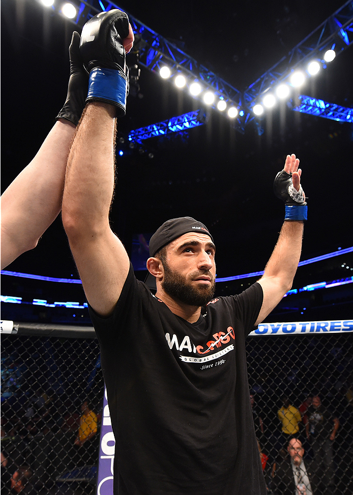 NEW ORLEANS, LA - JUNE 06: Omari Akhmedov celebrates his victory over Brian Ebersole in their welterweight bout during the UFC event at the Smoothie King Center on June 6, 2015 in New Orleans, Louisiana. (Photo by Josh Hedges/Zuffa LLC/Zuffa LLC via Get