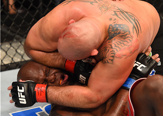 NEW ORLEANS, LA - JUNE 06: Shawn Jordan (top) elbows Derrick Lewis in their heavyweight bout during the UFC event at the Smoothie King Center on June 6, 2015 in New Orleans, Louisiana. (Photo by Josh Hedges/Zuffa LLC/Zuffa LLC via Getty Images)