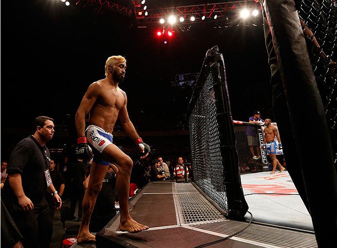BRASILIA, BRAZIL - SEPTEMBER 13: Godofredo Pepey of Brazil enters the Octagon before his featherweight bout against Dashon Johnson during the UFC Fight Night event inside Nilson Nelson Gymnasium on September 13, 2014 in Brasilia, Brazil. (Photo by Josh He