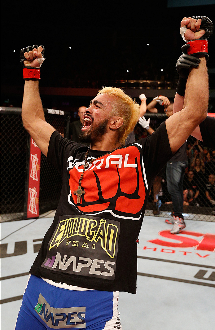 BRASILIA, BRAZIL - SEPTEMBER 13: Godofredo Pepey of Brazil celebrates after his submission victory over Dashon Johnson in their featherweight bout during the UFC Fight Night event inside Nilson Nelson Gymnasium on September 13, 2014 in Brasilia, Brazil. (