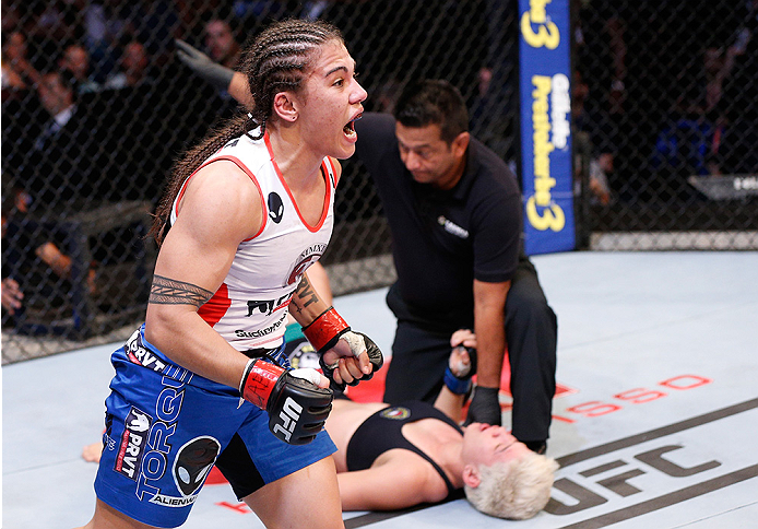 BRASILIA, BRAZIL - SEPTEMBER 13: Jessica Andrade of Brazil celebrates after her submission victory over Larissa Pacheco of Brazil in their women's bantamweight bout during the UFC Fight Night event inside Nilson Nelson Gymnasium on September 13, 2014 in