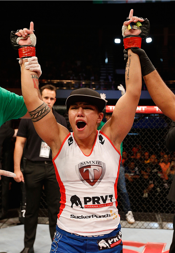 BRASILIA, BRAZIL - SEPTEMBER 13: Jessica Andrade of Brazil celebrates after her submission victory over Larissa Pacheco of Brazil in their women's bantamweight bout during the UFC Fight Night event inside Nilson Nelson Gymnasium on September 13, 2014 in
