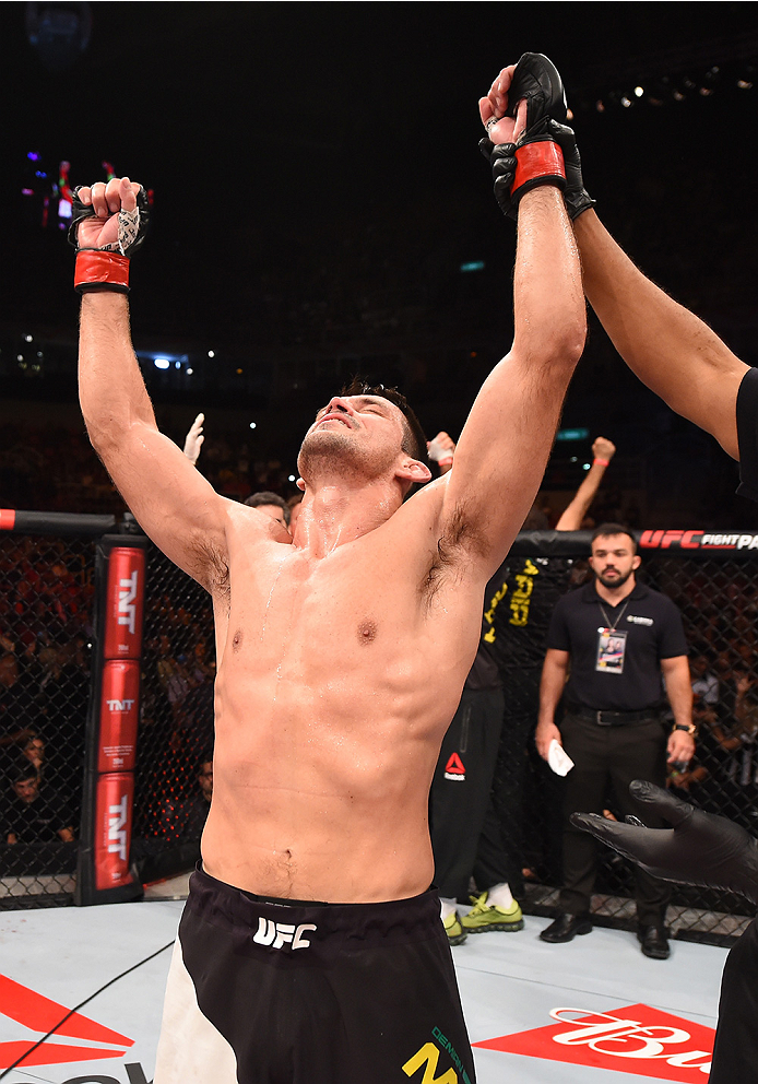 RIO DE JANEIRO, BRAZIL - AUGUST 01: Demian Maia of Brazil celebrates his submission victory over Neil Magny of the United States in their welterweight bout during the UFC 190 event inside HSBC Arena on August 1, 2015 in Rio de Janeiro, Brazil. (Photo by