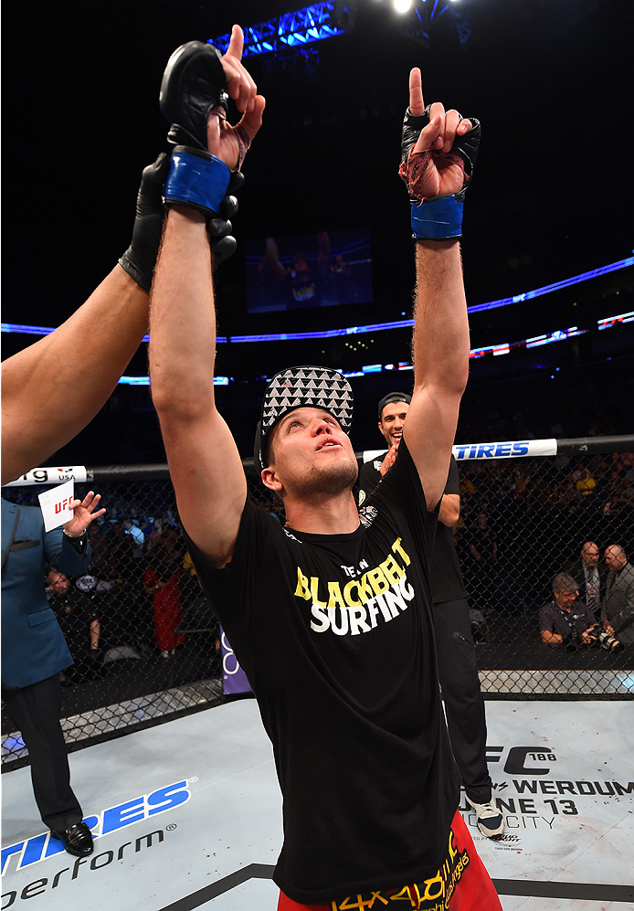NEW ORLEANS, LA - JUNE 06: Brian Ortega celebrates his victory over Thiago Tavares in their featherweight bout during the UFC event at the Smoothie King Center on June 6, 2015 in New Orleans, Louisiana. (Photo by Josh Hedges/Zuffa LLC/Zuffa LLC via Getty