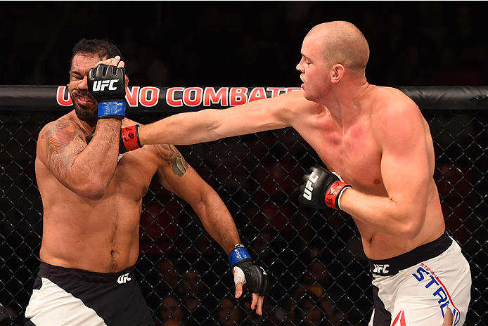 RIO DE JANEIRO, BRAZIL - AUGUST 01: (R-L) Stefan Struve of the Netherlands punches Rodrigo 'Minotauro' Nogueira of Brazil in their heavyweight bout during the UFC 190 event inside HSBC Arena on August 1, 2015 in Rio de Janeiro, Brazil. (Photo by Josh H