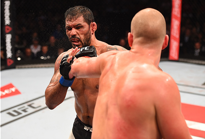RIO DE JANEIRO, BRAZIL - AUGUST 01: (R-L) Stefan Struve of the Netherlands punches Rodrigo 'Minotauro' Nogueira of Brazil in their heavyweight bout during the UFC 190 event inside HSBC Arena on August 1, 2015 in Rio de Janeiro, Brazil. (Photo by Josh H