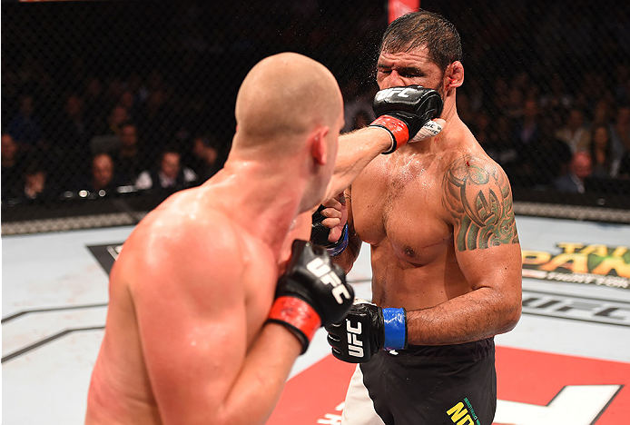 RIO DE JANEIRO, BRAZIL - AUGUST 01: (L-R) Stefan Struve of the Netherlands punches Rodrigo 'Minotauro' Nogueira of Brazil in their heavyweight bout during the UFC 190 event inside HSBC Arena on August 1, 2015 in Rio de Janeiro, Brazil. (Photo by Josh H