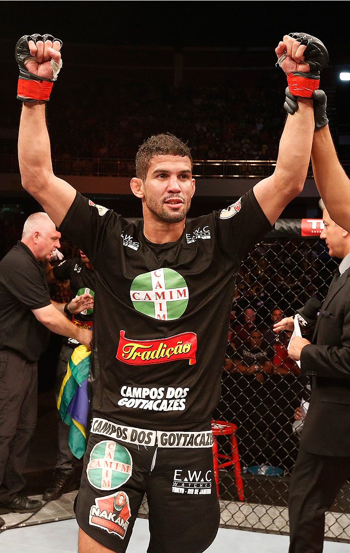 BRASILIA, BRAZIL - SEPTEMBER 13: Leonardo Santos of Brazil celebrates after his unanimous-decision victory over Efrain Escudero of Mexico in their lightweight bout during the UFC Fight Night event inside Nilson Nelson Gymnasium on September 13, 2014 in