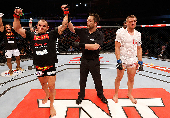 BRASILIA, BRAZIL - SEPTEMBER 13: Gleison Tibau of Brazil celebrates after his split-decision victory over Piotr Hallmann of Poland in their lightweight bout during the UFC Fight Night event inside Nilson Nelson Gymnasium on September 13, 2014 in Brasilia,