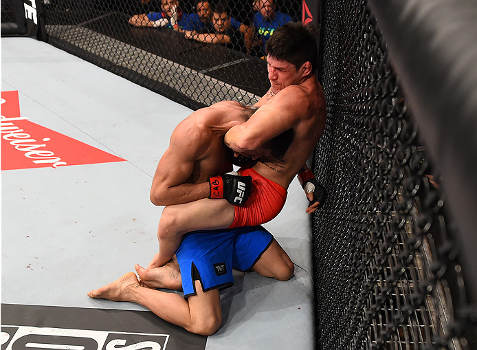 RIO DE JANEIRO, BRAZIL - AUGUST 01: (R-L) Dileno Lopes of Brazil attempts to submit Reginaldo Vieira of Brazil in their bantamweight bout during the UFC 190 event inside HSBC Arena on August 1, 2015 in Rio de Janeiro, Brazil. (Photo by Josh Hedges/Zuffa