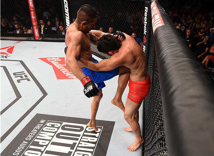 RIO DE JANEIRO, BRAZIL - AUGUST 01: (L-R) Reginaldo Vieira of Brazil knees Dileno Lopes of Brazil in their bantamweight bout during the UFC 190 event inside HSBC Arena on August 1, 2015 in Rio de Janeiro, Brazil. (Photo by Josh Hedges/Zuffa LLC/Zuffa LL