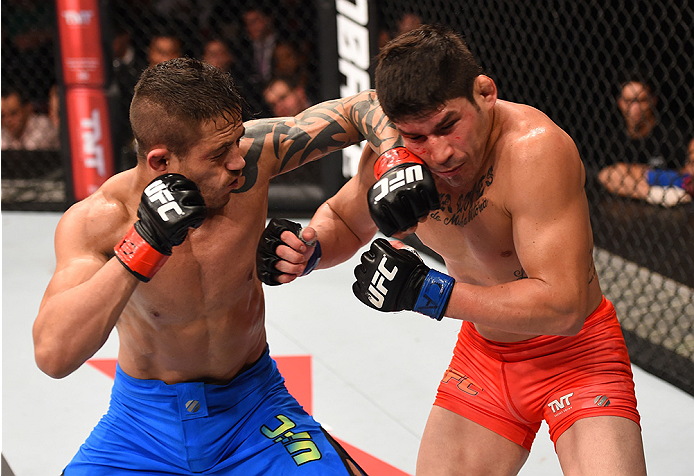 RIO DE JANEIRO, BRAZIL - AUGUST 01: (L-R) Reginaldo Vieira of Brazil punches Dileno Lopes of Brazil in their bantamweight bout during the UFC 190 event inside HSBC Arena on August 1, 2015 in Rio de Janeiro, Brazil. (Photo by Josh Hedges/Zuffa LLC/Zuffa