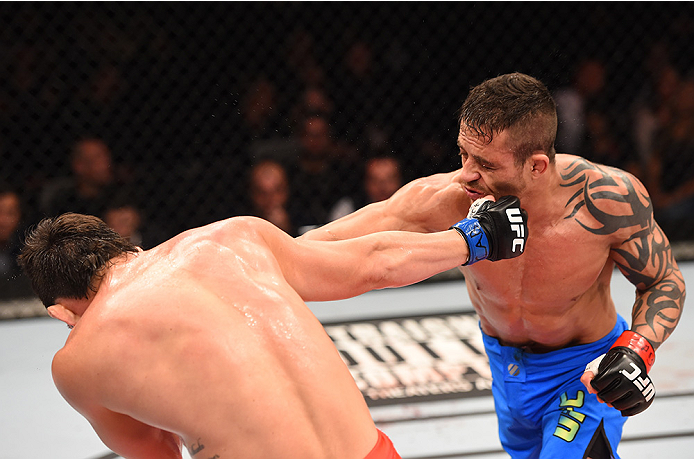 RIO DE JANEIRO, BRAZIL - AUGUST 01: (R-L) Reginaldo Vieira of Brazil exchanges punches with Dileno Lopes of Brazil in their bantamweight bout during the UFC 190 event inside HSBC Arena on August 1, 2015 in Rio de Janeiro, Brazil. (Photo by Josh Hedges/Z