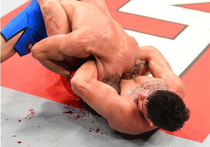 RIO DE JANEIRO, BRAZIL - AUGUST 01: (R-L) Dileno Lopes of Brazil attempts to submit Reginaldo Vieira of Brazil in their bantamweight bout during the UFC 190 event inside HSBC Arena on August 1, 2015 in Rio de Janeiro, Brazil. (Photo by Josh Hedges/Zuffa