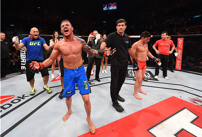RIO DE JANEIRO, BRAZIL - AUGUST 01: (L-R) Reginaldo Vieira of Brazil celebrates his victory over Dileno Lopes of Brazil in their bantamweight bout during the UFC 190 event inside HSBC Arena on August 1, 2015 in Rio de Janeiro, Brazil. (Photo by Josh Hed