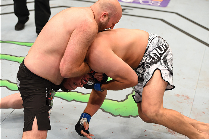NEW ORLEANS, LA - JUNE 06: (L-R) Ben Rothwell submits Matt Mitrione in their heavyweight bout during the UFC event at the Smoothie King Center on June 6, 2015 in New Orleans, Louisiana. (Photo by Josh Hedges/Zuffa LLC/Zuffa LLC via Getty Images)