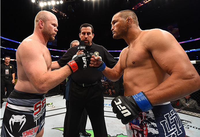 NEW ORLEANS, LA - JUNE 06: (L-R) Tim Boetsch and Dan Henderson face off in their middleweight bout during the UFC event at the Smoothie King Center on June 6, 2015 in New Orleans, Louisiana. (Photo by Josh Hedges/Zuffa LLC/Zuffa LLC via Getty Images)